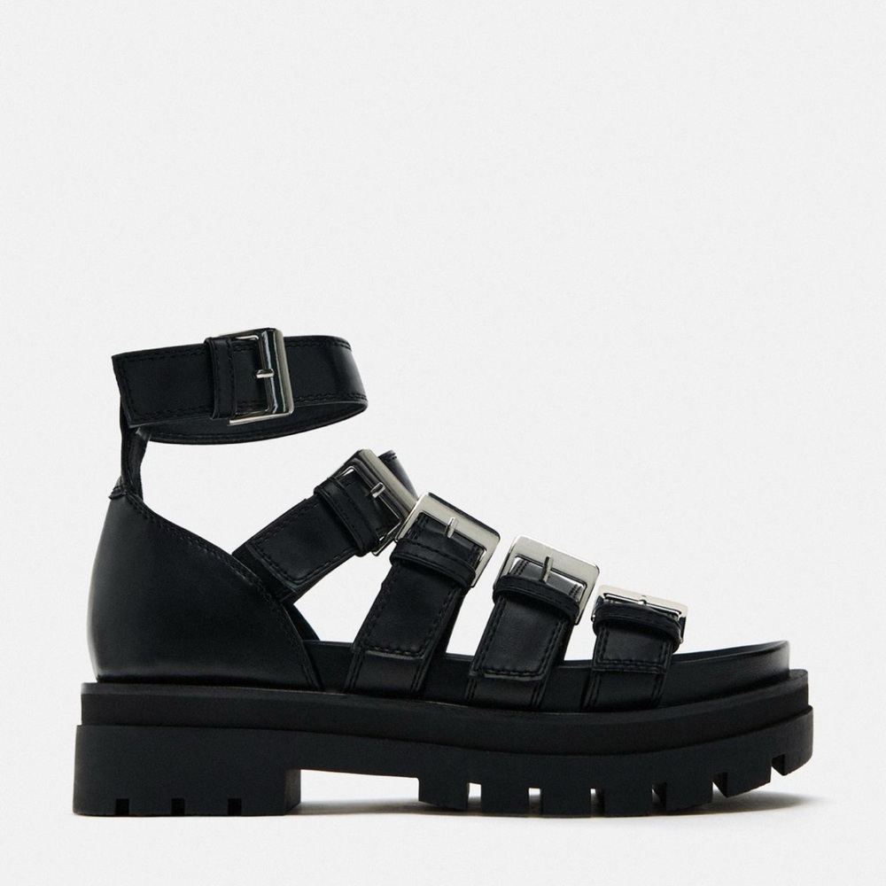 BUCKLED FLATFORM CAGE SANDALS